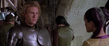 Movie still from “A Knight's Tale” (2001), directed by Brian Helgeland – A man and a woman dressed in medieval garb; Close Up shot, Over the shoulder angle