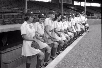 Movie still from “A League of Their Own” (1992), directed by Penny Marshall – A black and white photo of a baseball team; Wide shot, Low angle