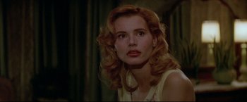 Movie still from “A League of Their Own” (1992), directed by Penny Marshall – A person with curly red hair; Close Up shot, Over the shoulder angle