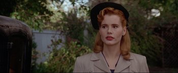 Movie still from “A League of Their Own” (1992), directed by Penny Marshall – A woman in a hat and a jacket; Close Up shot, Over the shoulder angle