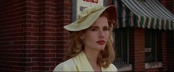 Movie still from “A League of Their Own” (1992), directed by Penny Marshall – A woman wearing a hat with a bow on her head; Close Up shot, Low angle