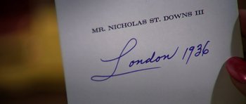 Movie still from “Airport '77” (1977), directed by Jerry Jameson – The signature of a person on a document; Extreme Close Up shot, Overhead angle