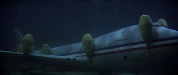 Movie still from “Airport '77” (1977), directed by Jerry Jameson – An underwater view of an airplane in the ocean; Extreme Wide shot, Low angle