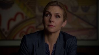 Movie still from “Better Call Saul” (2015), created by Vince Gilligan – A person wearing a suit and tie; Close Up shot, Low angle