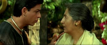 Movie still from “Asoka” (2001), directed by Santosh Sivan – A man and a woman talking to each other outside; Close Up shot, Over the shoulder angle