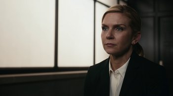 Movie still from “Better Call Saul” (2015), created by Vince Gilligan – A woman wearing a suit and looking to her left; Close Up shot, Low angle