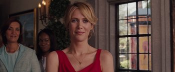 Movie still from “Bridesmaids” (2011), directed by Paul Feig – A person wearing a red dress; Close Up shot, Over the shoulder angle