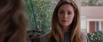 Movie still from “Bridesmaids” (2011), directed by Paul Feig – A person with long brown hair; Close Up shot, Over the shoulder angle