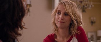 Movie still from “Bridesmaids” (2011), directed by Paul Feig – A person sitting in front of a window; Close Up shot, Over the shoulder angle