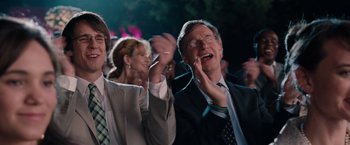 Movie still from “Bridesmaids” (2011), directed by Paul Feig – A group of people that are sitting in a room; Close Up shot, Over the shoulder angle