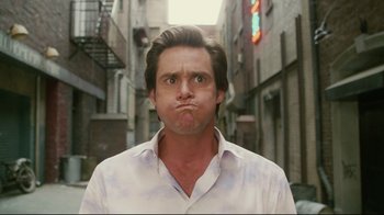 Movie still from “Bruce Almighty” (2003), directed by Tom Shadyac – A person wearing a white shirt; Close Up shot, Low angle