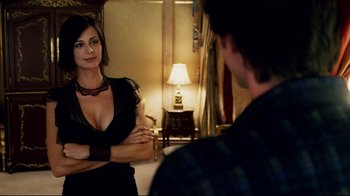 Movie still from “Bruce Almighty” (2003), directed by Tom Shadyac – A man and a woman are looking at one another in the mirror; Medium shot, Over the shoulder angle