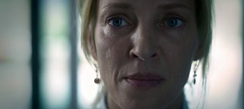 Movie still from “Chambers” (2019), created by Leah Rachel – A woman's face with blue eyes; Close Up shot, Low angle