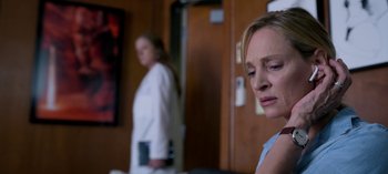 Movie still from “Chambers” (2019), created by Leah Rachel – Two women standing in a room with one of them looking sad; Close Up shot, Over the shoulder angle