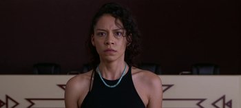 Movie still from “Chambers” (2019), created by Leah Rachel – A person wearing a necklace; Close Up shot, Low angle