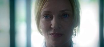 Movie still from “Chambers” (2019), created by Leah Rachel – A woman's face with blue eyes; Close Up shot, Low angle