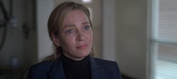 Movie still from “Chambers” (2019), created by Leah Rachel – A person wearing a suit jacket; Close Up shot, Over the shoulder angle