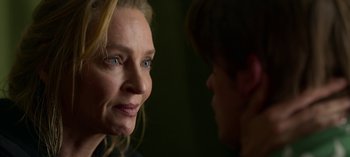 Movie still from “Chambers” (2019), created by Leah Rachel – A woman with blue eyes looking at another woman with blue eyes; Close Up shot, Over the shoulder angle