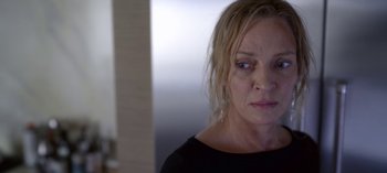 Movie still from “Chambers” (2019), created by Leah Rachel – A person wearing a black shirt; Close Up shot, Over the shoulder angle