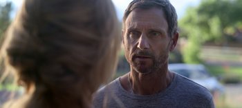 Movie still from “Chambers” (2019), created by Leah Rachel – A person talking to another person; Close Up shot, Over the shoulder angle