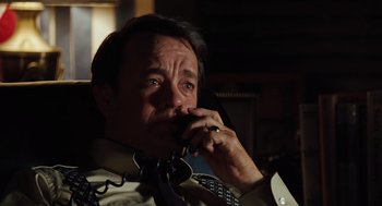 Movie still from “Charlie Wilson's War” (2007), directed by Mike Nichols – A man talking on the phone; Close Up shot, High angle