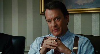 Movie still from “Charlie Wilson's War” (2007), directed by Mike Nichols – Tom hanks as forrest gump in the movie forrest gump; Close Up shot, Over the shoulder angle