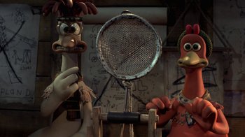 Movie still from “Chicken Run” (2000), directed by Peter Lord – A couple of cartoon characters standing next to each other; Close Up shot, Low angle