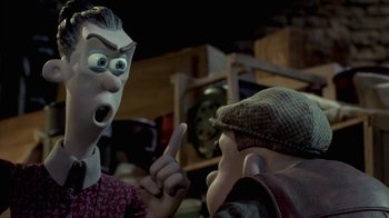 Movie still from “Chicken Run” (2000), directed by Peter Lord – A man and a woman talking to each other; Close Up shot, Over the shoulder angle