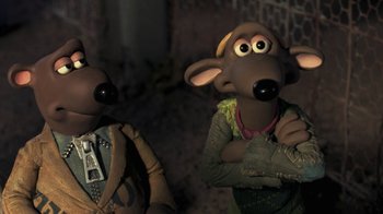 Movie still from “Chicken Run” (2000), directed by Peter Lord – A couple of people that are standing next to each other; Close Up shot, Low angle