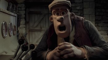 Movie still from “Chicken Run” (2000), directed by Peter Lord – An animated character with a surprised look on his face; Close Up shot, Over the shoulder angle