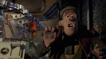 Movie still from “Chicken Run” (2000), directed by Peter Lord – A man with a knife in his hand in a scene from the movie wallace and gromit's world of horribleness; Close Up shot, Low angle