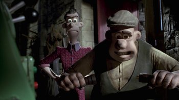 Movie still from “Chicken Run” (2000), directed by Peter Lord – A couple of cartoon characters standing next to each other; Medium shot, Low angle