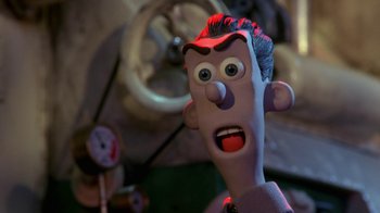 Movie still from “Chicken Run” (2000), directed by Peter Lord – The head of a cartoon character; Close Up shot, Low angle