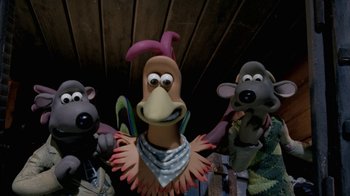 Movie still from “Chicken Run” (2000), directed by Peter Lord – View of a group of cartoon characters; Close Up shot, High angle
