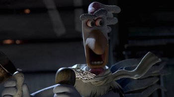 Movie still from “Chicken Run” (2000), directed by Peter Lord – The head of a cartoon character; Close Up shot, Low angle