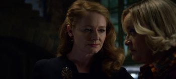 Movie still from “Chilling Adventures of Sabrina” (2018), created by Roberto Aguirre-Sacasa – A person with long hair; Close Up shot, Over the shoulder angle