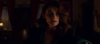 Movie still from “Chilling Adventures of Sabrina” (2018), created by Roberto Aguirre-Sacasa – A person with long hair; Close Up shot, Over the shoulder angle