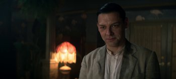 Movie still from “Chilling Adventures of Sabrina” (2018), created by Roberto Aguirre-Sacasa – A person wearing a jacket; Close Up shot, Low angle