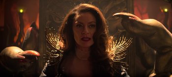 Movie still from “Chilling Adventures of Sabrina” (2018), created by Roberto Aguirre-Sacasa – A person with long hair; Close Up shot, Low angle