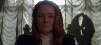 Movie still from “Chilling Adventures of Sabrina” (2018), created by Roberto Aguirre-Sacasa – A person with long hair; Close Up shot, Over the shoulder angle