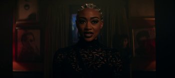 Movie still from “Chilling Adventures of Sabrina” (2018), created by Roberto Aguirre-Sacasa – A woman in a black lace dress with white hair; Close Up shot, Low angle