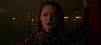 Movie still from “Chilling Adventures of Sabrina” (2018), created by Roberto Aguirre-Sacasa – A person wearing a leopard print shirt; Close Up shot, Over the shoulder angle