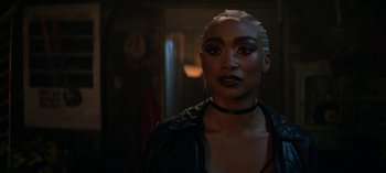 Movie still from “Chilling Adventures of Sabrina” (2018), created by Roberto Aguirre-Sacasa – A person wearing a leather jacket; Close Up shot, Over the shoulder angle