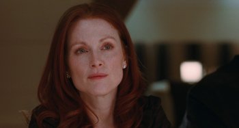 Movie still from “Chloe” (2009), directed by Atom Egoyan – A person with red hair; Close Up shot, Over the shoulder angle