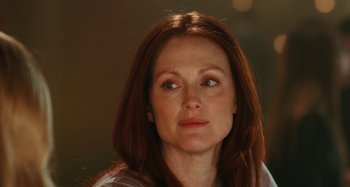 Movie still from “Chloe” (2009), directed by Atom Egoyan – Julianne moore is looking into the distance; Close Up shot, Over the shoulder angle