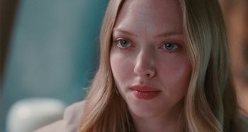 Movie still from “Chloe” (2009), directed by Atom Egoyan – A person with long hair; Close Up shot, Over the shoulder angle
