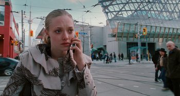 Movie still from “Chloe” (2009), directed by Atom Egoyan – A woman is talking on a cell phone; Close Up shot, High angle
