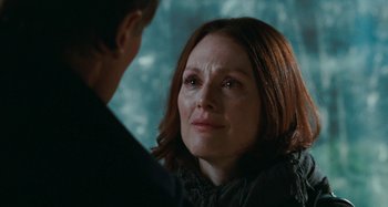 Movie still from “Chloe” (2009), directed by Atom Egoyan – A person looking at another person; Close Up shot, Over the shoulder angle