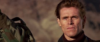 Movie still from “Clear and Present Danger” (1994), directed by Phillip Noyce – A person wearing a jacket; Close Up shot, Low angle