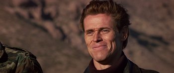 Movie still from “Clear and Present Danger” (1994), directed by Phillip Noyce – A person wearing a sweater; Close Up shot, Low angle